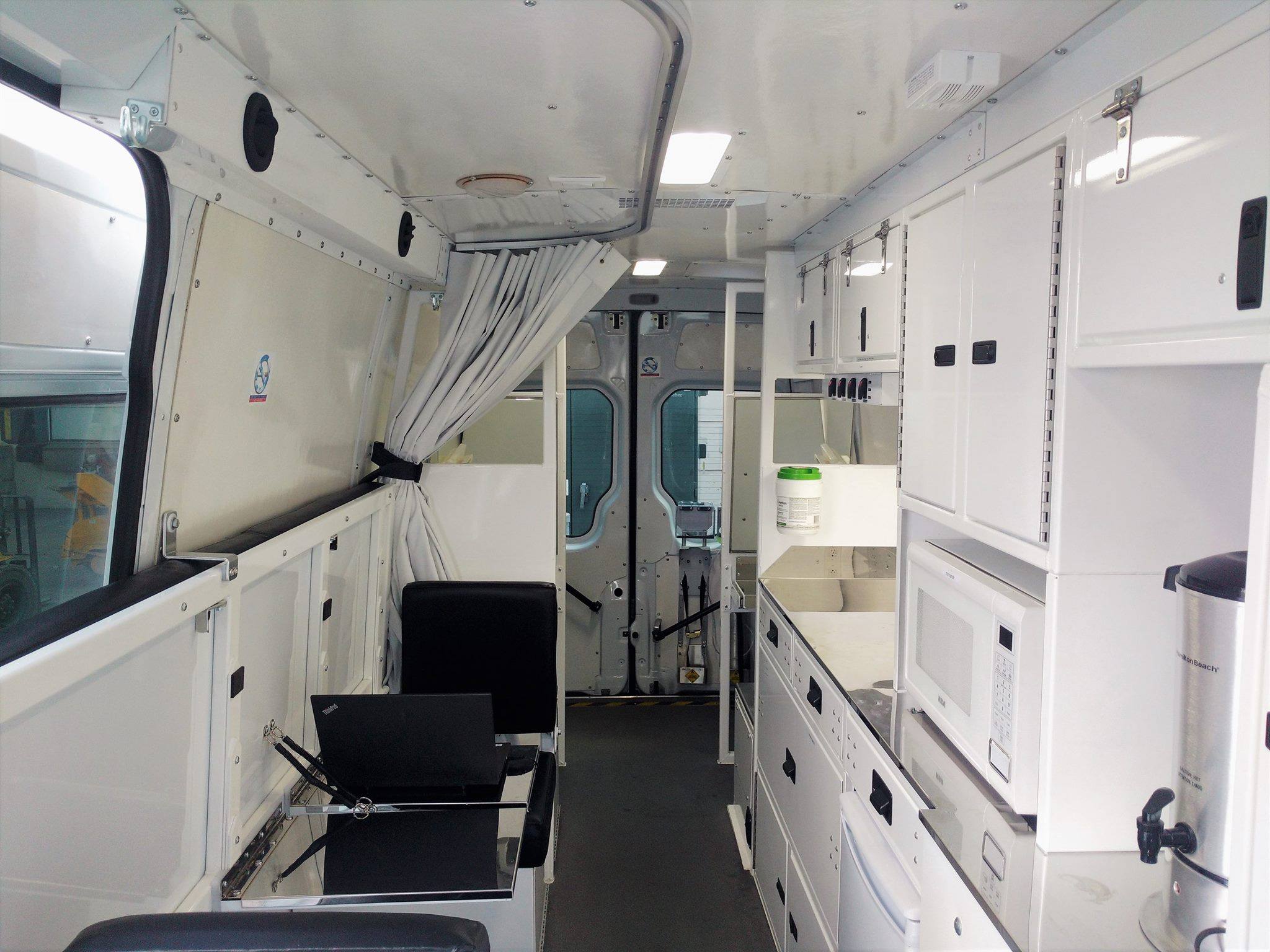 Photo of the inside of a large vehicle used for mobile safe injection services in Montreal, Canada